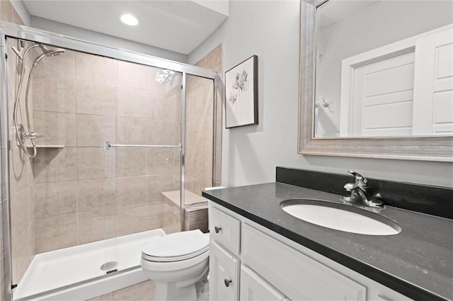 24957 W 98th St, Lenexa, KS 66227 - full bathroom with vanity, a stall shower, toilet, recessed lighting, and tile patterned flooring