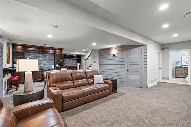 24957 W 98th St, Lenexa, KS 66227 - carpeted living room with stairway, recessed lighting, and baseboards