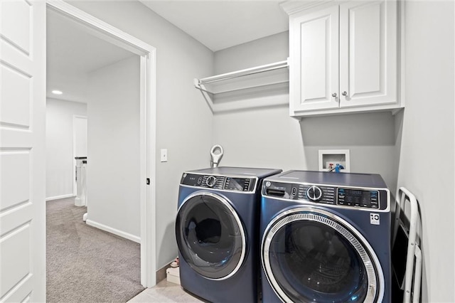 24957 W 98th St, Lenexa, KS 66227 - laundry room with washer and dryer, carpet flooring, cabinet space, and baseboards