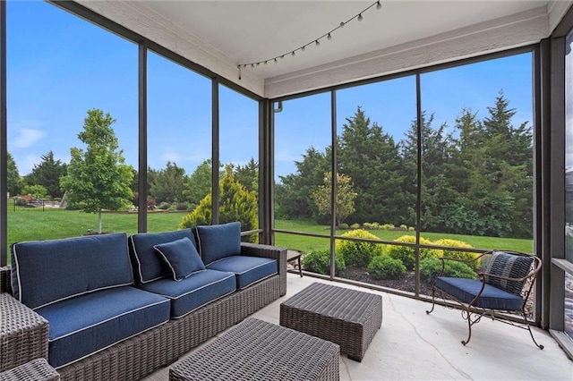 24957 W 98th St, Lenexa, KS 66227 - sunroom with an outdoor living space, view of scattered trees, and plenty of natural light