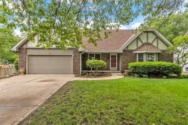 1600 NE 97th St, Kansas City, MO 64155 - view of front of property featuring a garage, concrete driveway, a front yard, brick siding, and roof with shingles