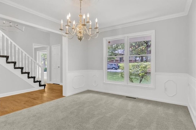 1600 NE 97th St, Kansas City, MO 64155 - unfurnished room with a chandelier, carpet, ornamental molding, stairway, and a wainscoted wall