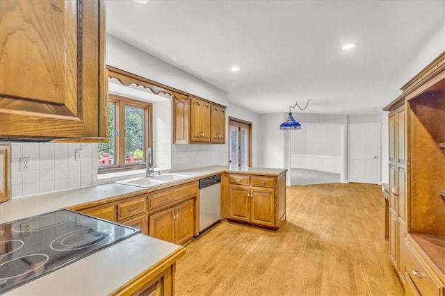 1600 NE 97th St, Kansas City, MO 64155 - kitchen with a sink, stainless steel dishwasher, a peninsula, tasteful backsplash, and recessed lighting