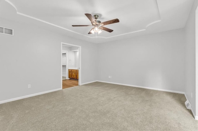 1600 NE 97th St, Kansas City, MO 64155 - unfurnished room with light carpet, a ceiling fan, and baseboards