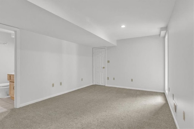 1600 NE 97th St, Kansas City, MO 64155 - carpeted empty room with baseboards and recessed lighting