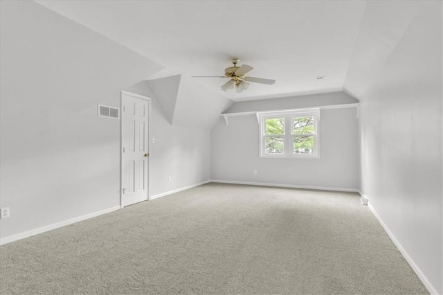 1600 NE 97th St, Kansas City, MO 64155 - bonus room with carpet flooring, ceiling fan, vaulted ceiling, and baseboards