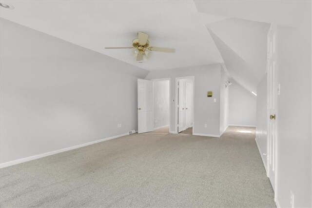 1600 NE 97th St, Kansas City, MO 64155 - additional living space featuring light colored carpet, a ceiling fan, and baseboards