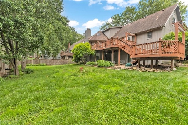 1600 NE 97th St, Kansas City, MO 64155 - back of house with a wooden deck, a chimney, and a shingled roof