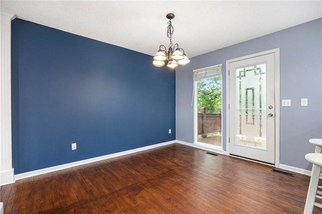 417 N Locust St, Gardner, KS 66030 - empty room with a chandelier and wood finished floors