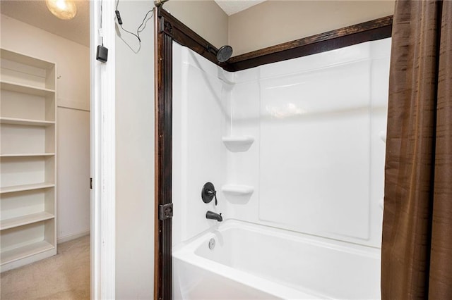 417 N Locust St, Gardner, KS 66030 - bathroom featuring shower / bathtub combination with curtain