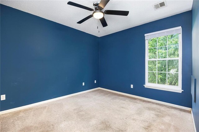 417 N Locust St, Gardner, KS 66030 - carpeted empty room featuring baseboards and ceiling fan
