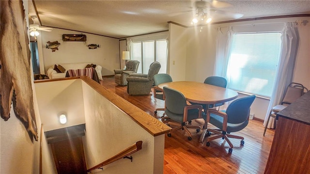 20435 Rb Hwy, Flemington, MO 65650 - dining area with a ceiling fan, light wood-style floors, crown molding, and vaulted ceiling