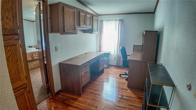 20435 Rb Hwy, Flemington, MO 65650 - office area with ornamental molding, a textured wall, hardwood / wood-style flooring, a textured ceiling, and baseboards