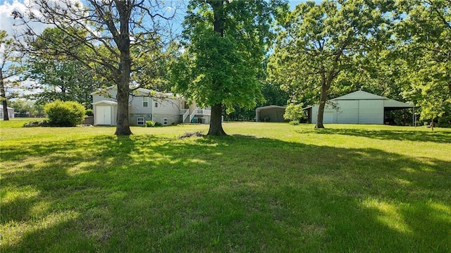 20435 Rb Hwy, Flemington, MO 65650 - view of green lawn with a detached carport