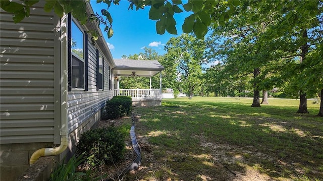 20435 Rb Hwy, Flemington, MO 65650 - view of grassy yard featuring a porch