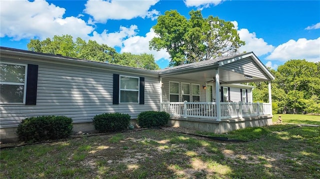 20435 Rb Hwy, Flemington, MO 65650 - view of front of property featuring covered porch and a front yard