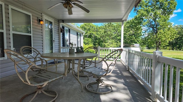 20435 Rb Hwy, Flemington, MO 65650 - view of patio with ceiling fan, view of scattered trees, and outdoor dining space