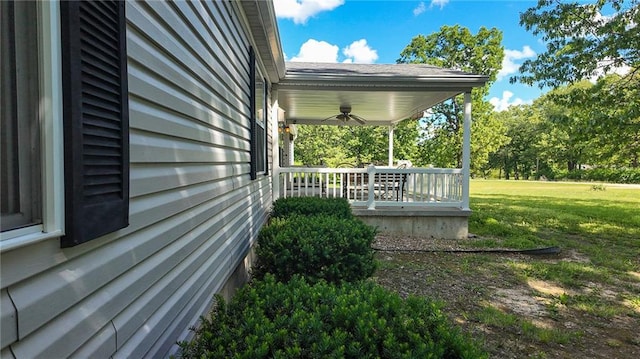20435 Rb Hwy, Flemington, MO 65650 - view of green lawn with covered porch and ceiling fan