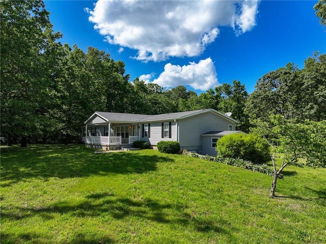 20435 Rb Hwy, Flemington, MO 65650 - view of front of property with a porch and a front lawn