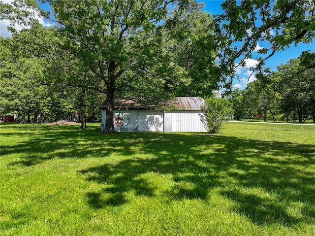 20435 Rb Hwy, Flemington, MO 65650 - view of green lawn with an outdoor structure and an outbuilding
