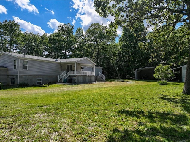 20435 Rb Hwy, Flemington, MO 65650 - view of green lawn with a detached carport