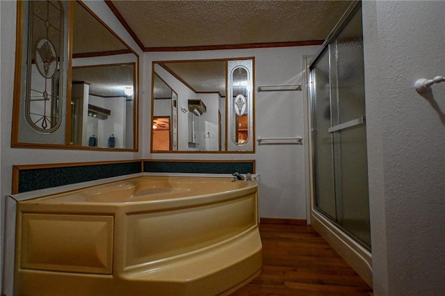 20435 Rb Hwy, Flemington, MO 65650 - full bath featuring a stall shower, wood finished floors, a textured ceiling, and a bath