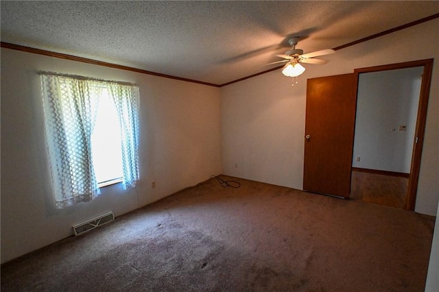 20435 Rb Hwy, Flemington, MO 65650 - carpeted spare room with crown molding, ceiling fan, and a textured ceiling