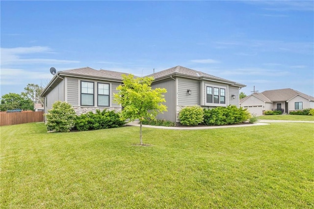 301 Sunrise Dr, Louisburg, KS 66053 - view of front of home with stone siding and a garage