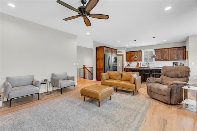 301 Sunrise Dr, Louisburg, KS 66053 - living area featuring recessed lighting, light wood finished floors, and ceiling fan