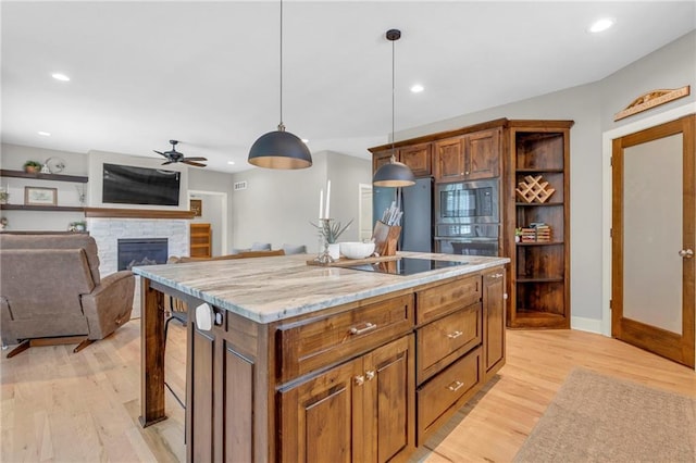 301 Sunrise Dr, Louisburg, KS 66053 - kitchen with black appliances, open shelves, ceiling fan, hanging light fixtures, and light wood-type flooring