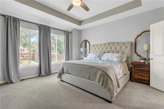 301 Sunrise Dr, Louisburg, KS 66053 - bedroom with light colored carpet, multiple windows, and baseboards
