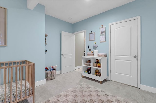 301 Sunrise Dr, Louisburg, KS 66053 - bedroom featuring carpet flooring, a nursery area, and baseboards
