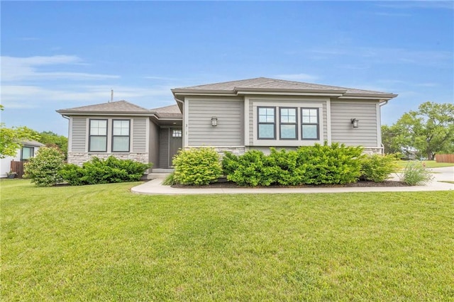 301 Sunrise Dr, Louisburg, KS 66053 - prairie-style home with a front yard and stone siding