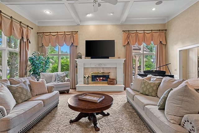 12613 Sherwood St, Leawood, KS 66209 - living area featuring coffered ceiling, ceiling fan, beamed ceiling, ornamental molding, and a fireplace