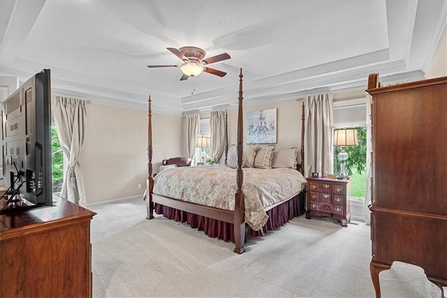 12613 Sherwood St, Leawood, KS 66209 - bedroom featuring a raised ceiling, light colored carpet, ceiling fan, ornamental molding, and baseboards
