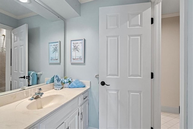 12613 Sherwood St, Leawood, KS 66209 - bathroom featuring vanity, tile patterned floors, crown molding, and baseboards