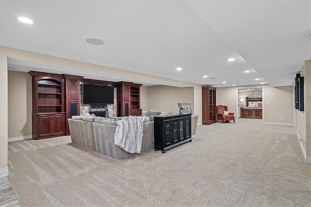 12613 Sherwood St, Leawood, KS 66209 - living area featuring light carpet, recessed lighting, baseboards, and a fireplace