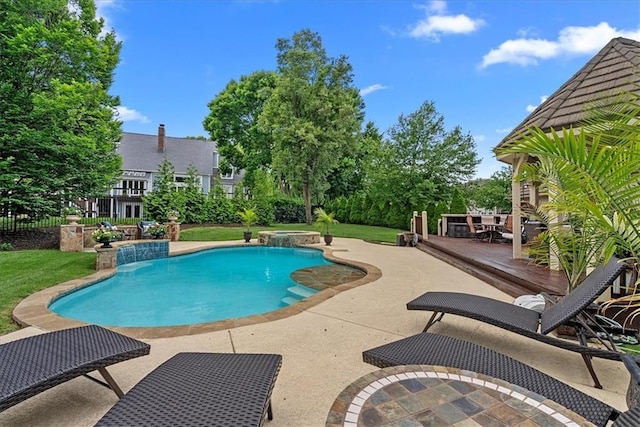 12613 Sherwood St, Leawood, KS 66209 - view of pool with a patio area, a pool with connected hot tub, and a wooden deck