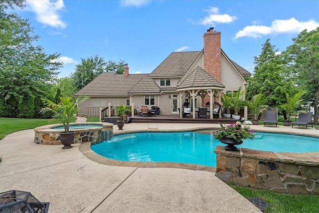 12613 Sherwood St, Leawood, KS 66209 - view of pool featuring a pool with connected hot tub and a patio area
