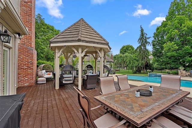 12613 Sherwood St, Leawood, KS 66209 - deck with a gazebo, an outdoor pool, and outdoor dining area