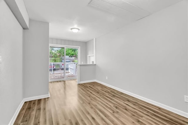 315 S Crane St S, Independence, MO 64050 - unfurnished room featuring wood finished floors and baseboards
