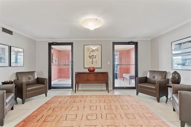 bedroom featuring light tile patterned floors, crown molding, and access to outside