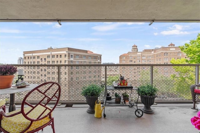 balcony featuring a view of city