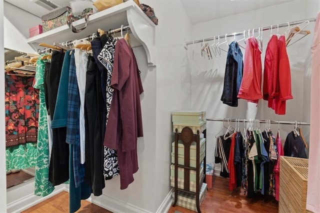 spacious closet featuring wood finished floors