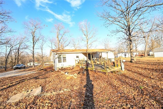 20662 Rb Hwy, Flemington, MO 65650 - rear view of property featuring a wooden deck