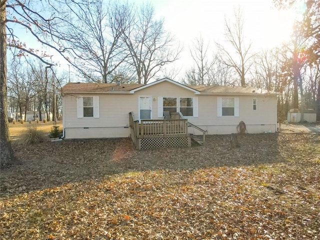 20662 Rb Hwy, Flemington, MO 65650 - rear view of property featuring crawl space and a wooden deck