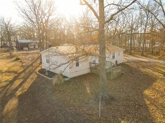 20662 Rb Hwy, Flemington, MO 65650 - view of side of home featuring a deck and central AC