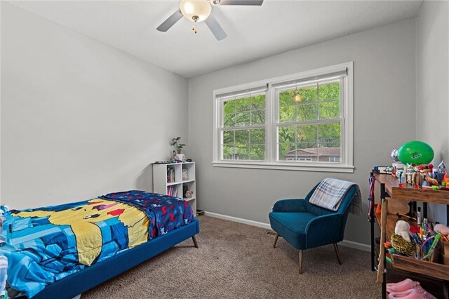 bedroom featuring carpet, baseboards, and ceiling fan