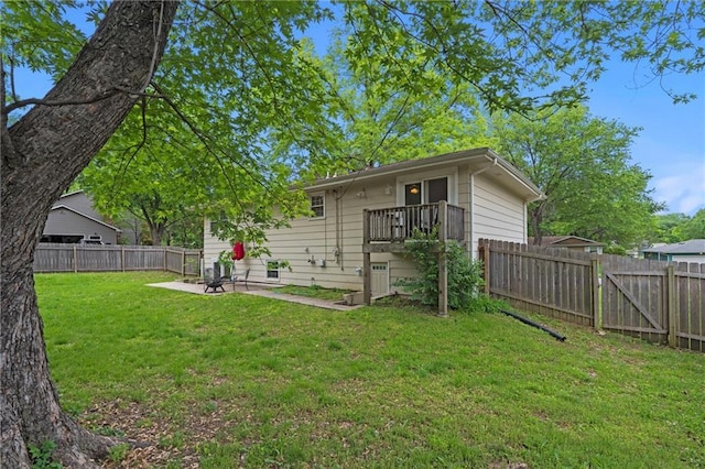 back of house featuring a patio area