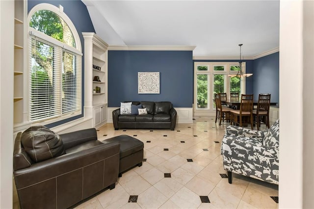 12843 Noland St, Overland Park, KS 66213 - living room with healthy amount of natural light, light tile patterned floors, crown molding, a wainscoted wall, and built in features